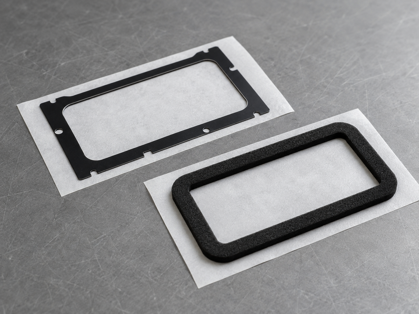 Precision die-cut black PET and foam gasket frames with accurate optical window openings